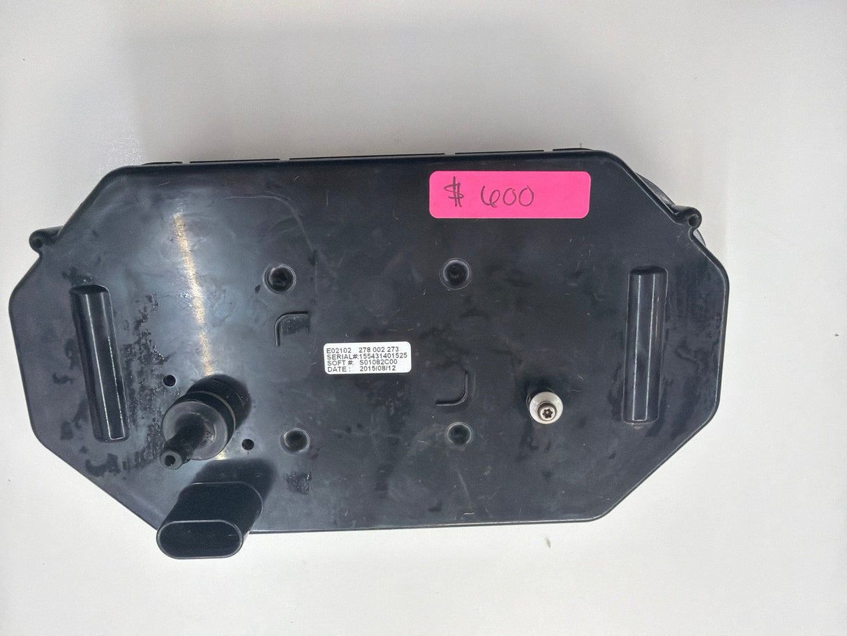 Black mechanical component with a label on a white background