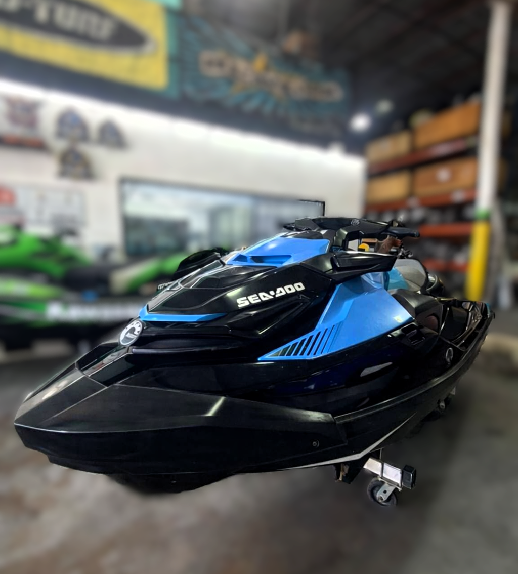 Pre-owned 2019 Sea Doo RXT 230 jet ski with supercharged engine, showing sleek design and detailing, 90 hours used.