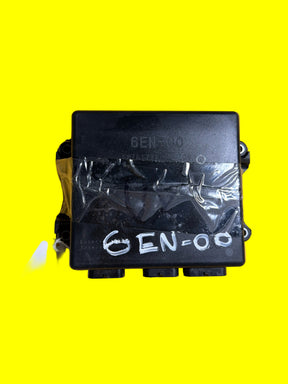 Yamaha jet ski ECU 6EN-00 part on yellow background, Miami Jet Ski Motorsports