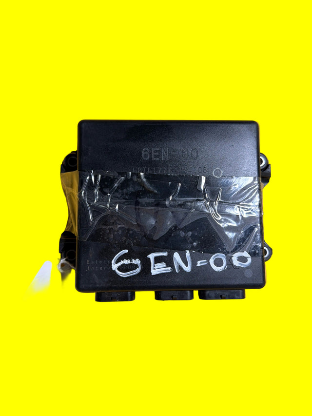 Yamaha jet ski ECU 6EN-00 part on yellow background, Miami Jet Ski Motorsports