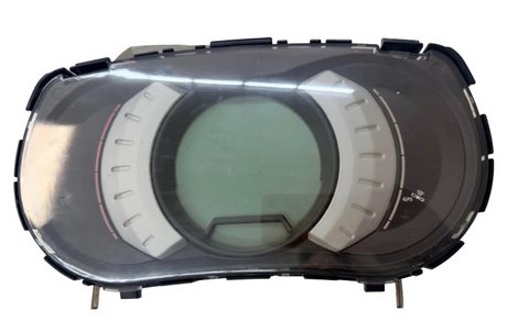 Top-down view of a futuristic device with a circular screen on a white surface