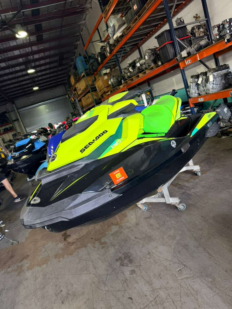 Pre-owned 2019 Sea-Doo GTX SE 130 jet ski with 75 hours, featuring a supercharged engine, displayed on water.