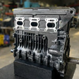 Remanufactured Sea-Doo 215 engine 1500cc by Miami Jet Sports, ready for installation, shown in a detailed view.