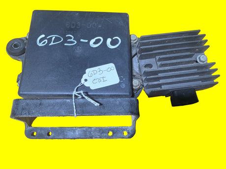 Yamaha 6D3-00 CDI computer jet ski ignition part on yellow background, Miami Jet Ski Motorsports