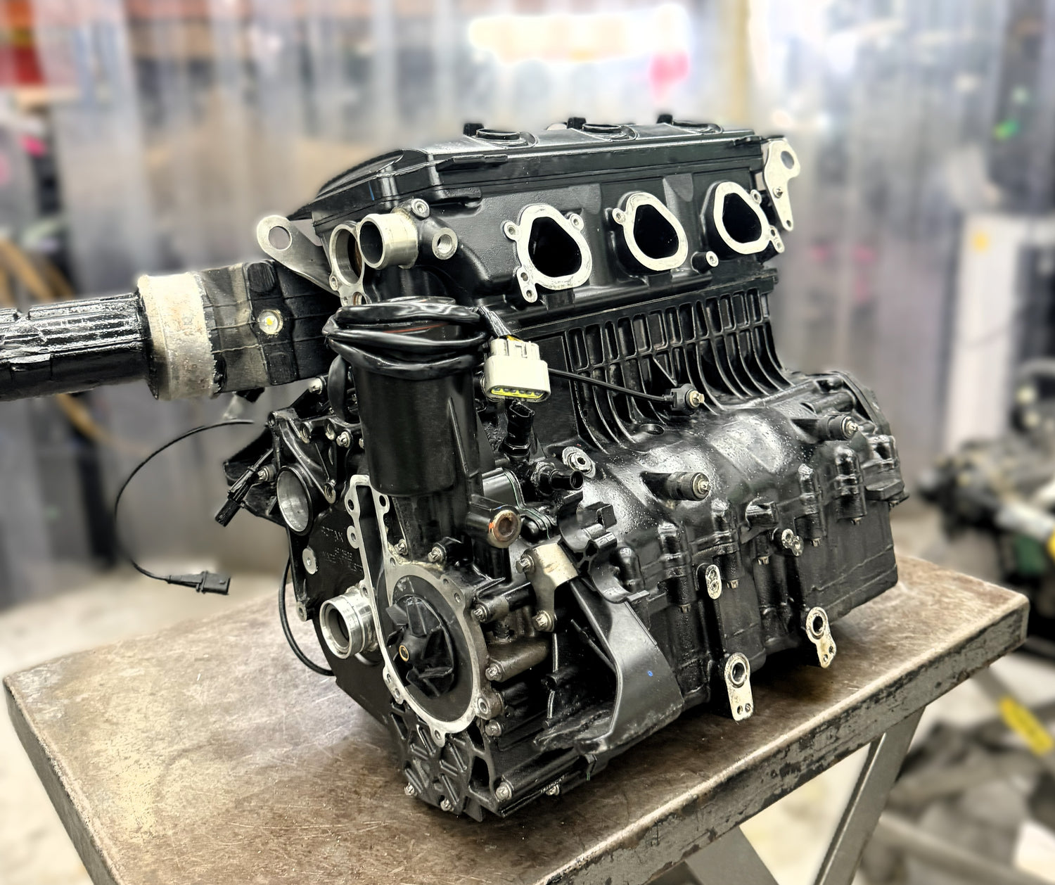 Pre-owned Sea-Doo 300 engine with 1603cc, only 18 hours, ready for installation, shown in the image.