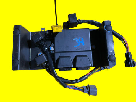 OEM Kawasaki ECU with programming key, electrical part from MIAMIJETSKIMOTORSPORTS, shown with connectors and circuit board details.
