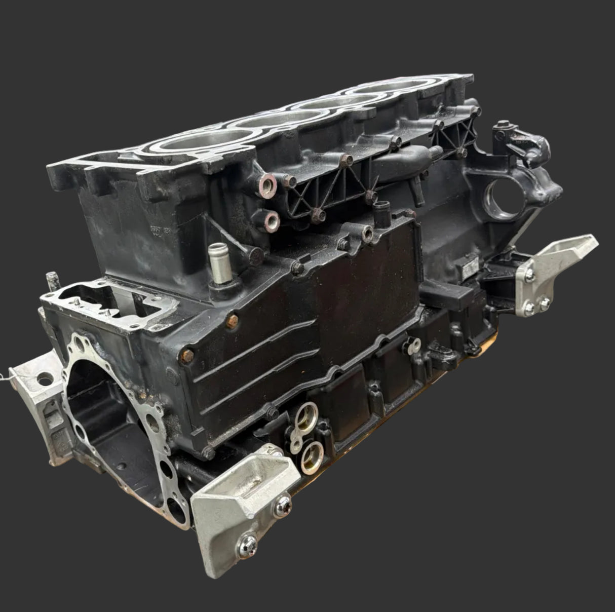 Remanufactured Yamaha 1.8L SHO short block engine with new crankshaft, pistons, and bearings on engine stand.