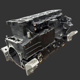 Remanufactured Yamaha 1.8L SHO short block engine with new crankshaft, pistons, and bearings on engine stand.