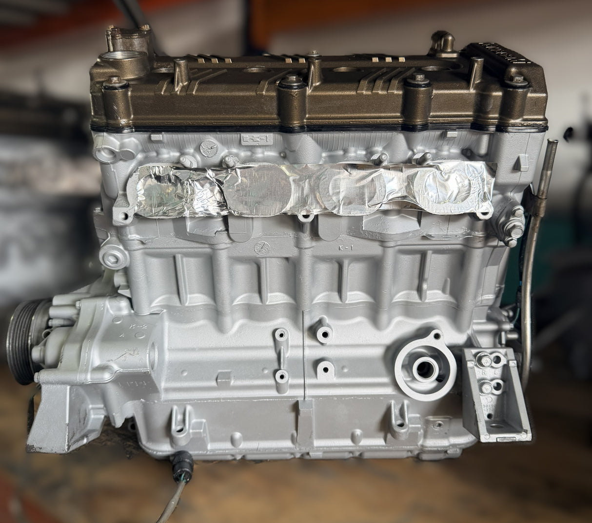 Car engine block on a blurred background