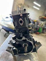 Remanufactured Yamaha 1.8L SVHO engine for FX Cruiser SVHO, FX SVHO, and GP1800R SVHO jet skis, shown from the side with engine components.