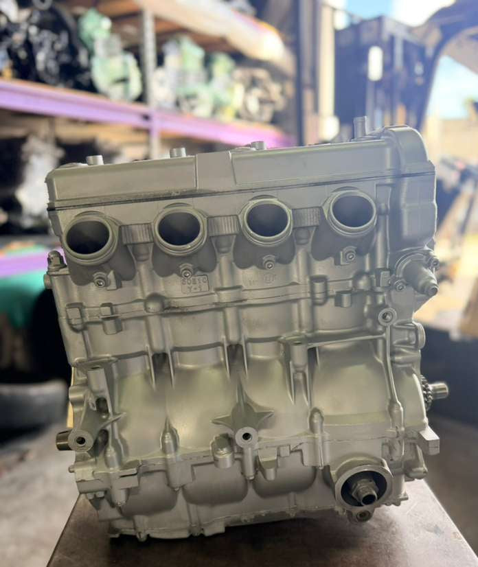 Remanufactured Yamaha 1100 cc 4-stroke engine by MIAMIJETSKIMOTORSPORTS, showcasing the long block engine unit.