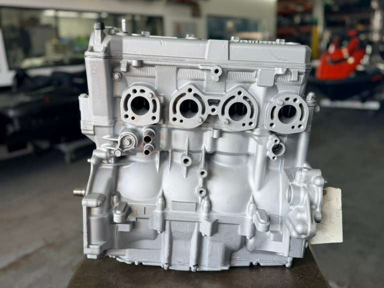 Remanufactured Yamaha 1100 cc 4-stroke engine by MIAMIJETSKIMOTORSPORTS, showing the long block unit with visible engine components.
